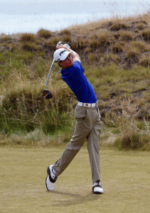 Cole Hammer of the United States hits a tee shot on the 11th hole during a practice round prior to the start of the 115th U.S. Open Championship at Chambers Bay in University Place, Washington.  AFP PHOTO