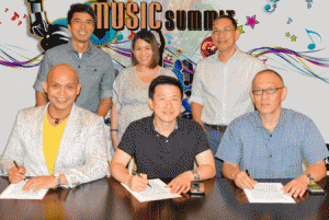 Mossimo and Curve Entertainment executives partner for the Mossimo Music Summit 2015: (seated from left) Marex Gaba, event director; Adamson Bactat, Mossimo vice president for Business Development; Narciso Chan, Curve Entertainment CEO; (standing from left) Mario Joson, Curve Entertainment vice president for Business Development; Magnolia David, Mossimo marketing director; and Vic Valenciano, Curve Entertainment vice president