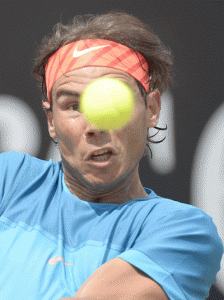 Spain’s Rafael Nadal returns the ball to Australia’s Bernard Tomic during their quarterfinal match at the ATP Mercedes Cup tennis tournament in Stuttgart Germany on Saturday. AFP PHOTO