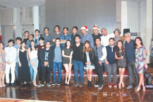 Professor Ryan Cayabyab (front row, second from right) presents the composers and interpreters of this year’s PhilPop song search