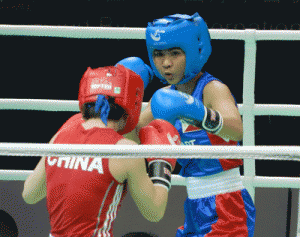 Josie Gabuco throws a left jab against Xu Shiqi of China. CONTRIBUTED PHOTO