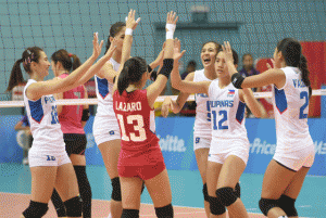 Philippines players react after scoring a point against Malaysia’s team during their volleyball women’s preliminary round at the 28th Southeast Asian Games (SEA Games) in Singapore on Thursday. AFP PHOTO