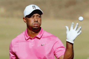 Tiger Woods catches a golf ball on the practice range during a practice round prior to the start of the 115th U.S. Open Championship at Chambers Bay on Thursday in University Place, Washington. AFP PHOTO