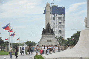 TURN ME LOOSE The 49-story Torre de Manila looms on the skyline behind the tomb and monument of national hero Jose Rizal. The building has been derided in social media as the ‘national photobomber’ in a nod to the monument’s status as one of the country’s most photographed structures. PHOTO BY BONG RANES