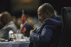 INDICTED  Sudanese President Omar al-Bashir attends the opening session at the 25th African Union Summit in Sandton, Johannesburg on June 14, 2015. Bashir joined the African Union summit in Johannesburg despite the International Criminal Court calling for him to be arrested at the event. AFP PHOTO