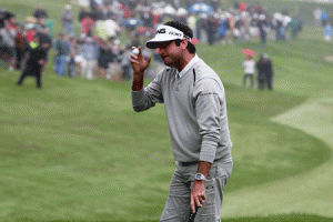 Bubba Watson tips his hat on the 18th green during the final round of the Travelers Championship at TPC River Highlands in Cromwell, Connecticut. AFP PHOTO
