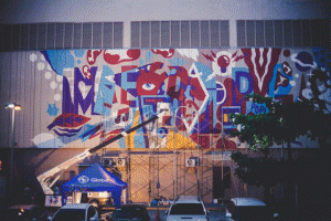 The artist’s work on the huge wall of the C1 building along Bonifacio High Street