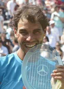 Spain’s Rafael Nadal poses with the trophy after defeating Serbia’s Viktor Troicki in the final match of the ATP Mercedes Cup tennis tournament in Stuttgart, southern Germany, on Sunday. AFP PHOTO