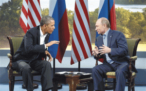 US WARNS ON RUSSIAN MOVES US President Barack Obama in conversation with Russian President Vladimir Putin in a June 2013 summit.  AFP PHOTO