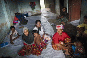 NOWHERE TO GO  Migrants who were rescued at sea on a boat are pictured at the Taung Pyo temporary refugee camp, located near the Bangladesh border, in the Myanmar state of Rakhine on June 7, 2015. Since Southeast Asia’s migrant crisis erupted more than a month ago, 4,500 Rohingya and Bangladeshi migrants have been washed ashore, and the UN estimates that around 2,000 others are still trapped at sea. AFP PHOTO