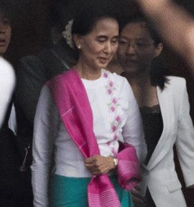 FIRST VISIT Myanmar pro-democracy leader Aung San Suu Kyi leaves the airport following her arrival in Beijing on June 10, 2015. Myanmar opposition leader Aung San Suu Kyi arrived in China June 10, an AFP journalist said, making her first visit at a time of cooling relations between the once closely bonded nations. AFP PHOTO