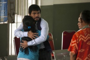 Morale booster Boxing champion Manny Pacquiao hugs Mary Jane Veloso during his visit to Wirogunan prison in Yogyakarta on Friday.  AFP PHOTO