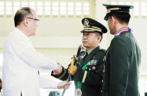 Right choice President Benigno Aquino 3rd congratulates his new Army chief, Maj. Gen. Eduardo Año. Also in photo is the AFP chief of staff, Lt. Gen. Hernando Iriberri. malacañang photo retirementEnriqueta E. Vidal, Clerk of Court of the Supreme Court En Banc retired Wednesday after 39 years of service. She is shown receiving a Plaque of Recognition from the Chief Justice, flanked by the Associate Justices of the Court. She is replaced by Felipa Anama (left). 