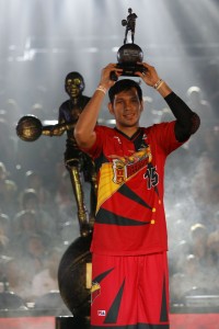 San Miguel Beermen's June Mar Fajardo hoists his Most Valuable Player award for the 40th season of the PBA at the Smart Araneta Coliseum in Quezon City on Friday. PHOTO BY MIGUEL DE GUZMAN