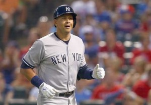 Alex Rodriguez #13 of the New York Yankees rounds the bases after hitting a solo home run against the Texas Rangers in the top of the sixth inning at Globe Life Park in Arlington on July 27, 2015 in Arlington, Texas. AFP PHOTO