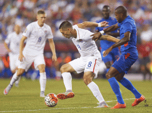 Kim Jaggy No.4 of Haiti defends Clint Dempsey No.8 of United States during the 2015 CONCACAF Gold Cup Group A match between United States and Haiti at Gillette Stadium on Saturday in Foxboro, Massachusetts. AFP PHOTO