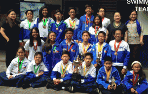 Former Sen. Nikki Coseteng and coach Rochelle Dimalanta pose with Diliman Preparatory School swimming team. CONTRIBUTED PHOTO