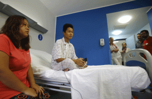 FEELING BETTER Sarah (left) and Reynaldo sit in a hospital room in the Sudanese capital, Khartoum. AFP PHOTO