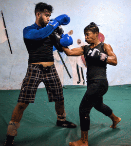 Cuban boxer Namibia Flores (right) trains at a gym in Havana. The 39-year-old boxer is in a unique race against time to achieve an athletic dream in a country where female boxing is not recognized. AFP PHOTO