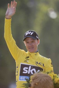 Tour de France 2015’s winner Great Britain’s Christopher Froome celebrates his victory on the podium on the Champs-Elysees avenue, at the end of the 109,5 km twenty-first and last stage of the 102nd edition of the Tour de France cycling race on Monday, between Sevres and Paris. AFP PHOTO