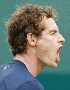 Andy Murray reacts against France’s Jo-Wilfried Tsonga during their Davis Cup world group quarterfinals match at the Queen’s Club in West London on Saturday. AFP PHOTO