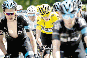 Great Britain’s Christopher Froome (center), wearing the overall leader’s yellow jersey, rides during the 186,5 km eighteenth stage of the 102nd edition of the Tour de France cycling race on Friday, between Gap and Saint-Jean-de-Maurienne, French Alps. AFP PHOTO