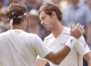 Roger Federer (left) commiserates Britain’s Andy Murray after beating him during their men’s semi-final match on day eleven of the 2015 Wimbledon Championships at The All England Tennis Club in Wimbledon, southwest London, on Saturday. AFP PHOTO