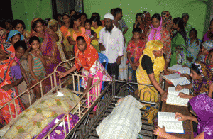 STAMPEDE VICTIMS  Bangladeshi relatives surround the bodies of some of those killed in a stampede during a Ramadan charity handout in Mymensingh on July 10. At least 23 people were killed as hundreds of desperately poor people tried to get their hands on free clothing, police said. The stampede in the northern city of Mymensingh erupted when crowds of people tried to force their way into a factory compound through a small gate after massing outside before dawn, according to local police chiefs. AFP PHOTO