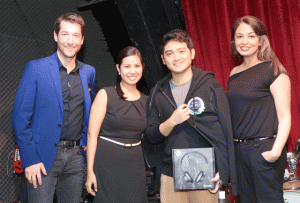 Celebrating the young rapper’s (second from right) milestone were (from left) Dan Horan, Globe’s senior advisor for consumer business; Trina Sebastian, TM’s head of portfolio and brand management and Sunita Kaur, Spotify’s managing director for Asia