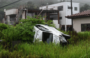 REMINDER OF A CATASTROPHE This photo taken on July 16, 2015 shows a vehicle and houses damaged by the March 11, 2011 tsunami still untouched after four years, in the village of Tomioka north of Naraha in Fukushima prefecture. Activists say despite government assurances that areas like Naraha and others further away from the Fukushima nuclear plant are safe, many still show highly-elevated levels of contamination, and many are unfit for habitation. AFP PHOTO