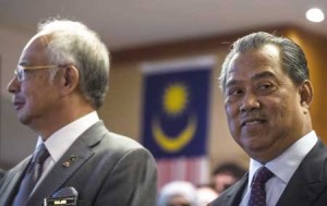 UNEMPLOYED  In this picture taken on July 8, 2015 Malaysian Deputy Prime Minister Muhyiddin Yassin (R) looks on during an event for new government interns at the Prime Minister’s office in Putrajaya. Embattled Malaysian Prime Minister Najib Razak on July 28 replaced his deputy premier Muhyiddin Yassin, who has been critical of Najib’s handling of the scandal involving state-owned development company 1Malaysia Development Berhad (1MDB), and sacked his attorney general amid a furor over a mushrooming scandal that is threatening his hold on office. AFP PHOTO