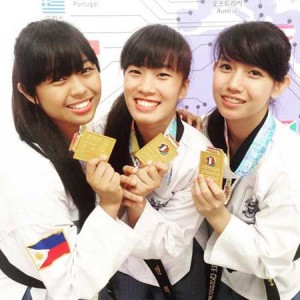 Women’s team senior gold medalists Rinna Babanto, Jocel Lyn Ninobla and Juvenile Crisostomo. CONTRIBUTED PHOTO