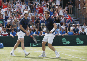 VICTORIOUS BROTHERS  Britain’s Jamie Murray (left) and Andy Murray celebrate after winning the third set against France’s Jo-Wilfried Tsonga and Nicolas Mahut during a Davis Cup world group quarterfinals doubles tennis match at Queen’s Club in west London on Sunday. AFP