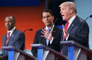 WHITE HOUSE RACE  (Left to Right) Republican presidential candidates Ben Carson, Wisconsin Gov. Scott Walker and Donald Trump participate in the first prime-time presidential debate hosted by Fox News and Facebook at the Quicken Loans Arena on Thursday (Friday in Manila) in Cleveland, Ohio. AFP PHOTO