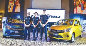 Suzuki Philippines officials pose with the all-new Celerio: (left to right) Managing Director Norminio Mojica, president Hiroshi Suzuki and General Manager for Automobile Shuzo Hoshikura.