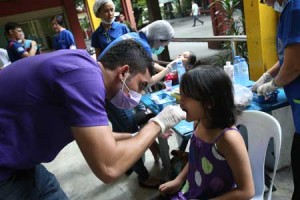 Iranian medicine and dentistry students attend to some 500 patients who received free treatments