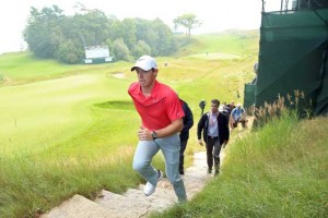 Rory McIlroy of Northern Ireland walks up a set of stairs after a practice round prior to the 2015 PGA Championship at Whistling Straits on Tuesday in Sheboygan, Wisconsin. AFP PHOTO