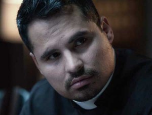Michael Peña portrays the role of an ex-military soldier turned priest