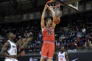 SHOWTIME IN AFRICA NBA Team World’s Spanish player Pau Gasol (center) of the Chicago Bulls scores during the NBA Africa basketball match between Team Africa and Team World on Sunday in Johannesburg.  AFP PHOTO