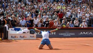 Spain’s Rafael Nadal celebrates after defeating Italy’s Fabio Fognini in their final tennis match of the ATP tennis tournament in Hamburg, northern Germany on Monday. AFP PHOTO