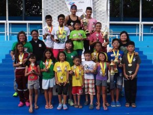 Philippine Swimming League (PSL) President Susan Papa, Secretary General Maria Susan Benasa, GMA-Aklan’s DZMM Station Manager Butch Maquinto with the Most Outstanding Swimmer awardees in the 80th Philippine Swimming League (PSL) National Series dubbed as the Vice Mayor Isko Moreno Top 16 Long Course Swimming Meet. CONTRIBUTED PHOTO