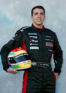 A file photo taken on March 6, 2003 shows then rookie British driver Justin Wilson displaying his helmet on the eve of the first qualifying session of the Australian Formula One Grand Prix in Melbourne. AFP PHOTO