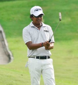 Juvic Pagunsan lines up his birdie putt on No. 18. CONTRIBUTED PHOTO