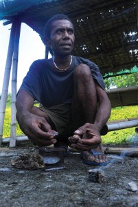  edward Serrano holds stone to start a fire in Sapang uwak in much the same way Stone-age man must have done two million years ago. AFP PhOTO 