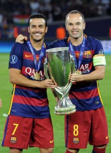 BEST BOOTERS  Barcelona’s midfielder Andres Iniesta (left) and Barcelona’s forward Pedro Rodriguez celebrate with the trophy after winning the UEFA Super Cup final football match between FC Barcelona and Sevilla FC on Wednesday at the Boris Paichadze Dinamo Arena in Tbilisi. AFP PHOTO