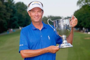 Davis Love 3rd poses with the Sam Snead Cup after winning the Wyndham Championship at Sedgefield Country Club on Monday in Greensboro, North Carolina. AFP PHOTO