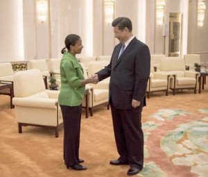 DELIVERING A WARNING?  Chinese President Xi Jinping (R) meets US National Security Advisor Susan Rice at the Great Hall of the People in Beijing, on August 28. US President Barack Obama sent Rice to Beijing, hoping to work through tensions over cyber attacks, the South China Sea and financial turmoil ahead of Chinese President Xi Jinping’s visit to Washington in September. AFP PHOTO 