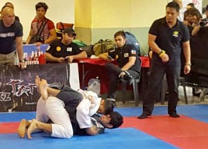 Contestants test their grappling prowess in the gi (wearing traditional jiu-jitsu uniform) event of the Philippine Jiu-Jitsu Gi/No Gi National Championships held at the Event Center of SM City Sucat, Paranaque City over the weekend. CONTRIBUTED PHOTO