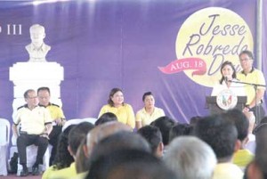 MY CHOSEN ONES  President Benigno Aquino 3rd listens as Camarines Sur Rep. Leni Robredo speaks in a forum marking Jesse Robredo’s death anniversary. At her back is Interior Secretary Manuel Roxas 2nd. PHOTO BY RHAYDZ BARCIA