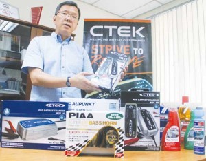 Edbert Tiu shows a sampling of the products he markets in the Philippines that include CTEK battery chargers.